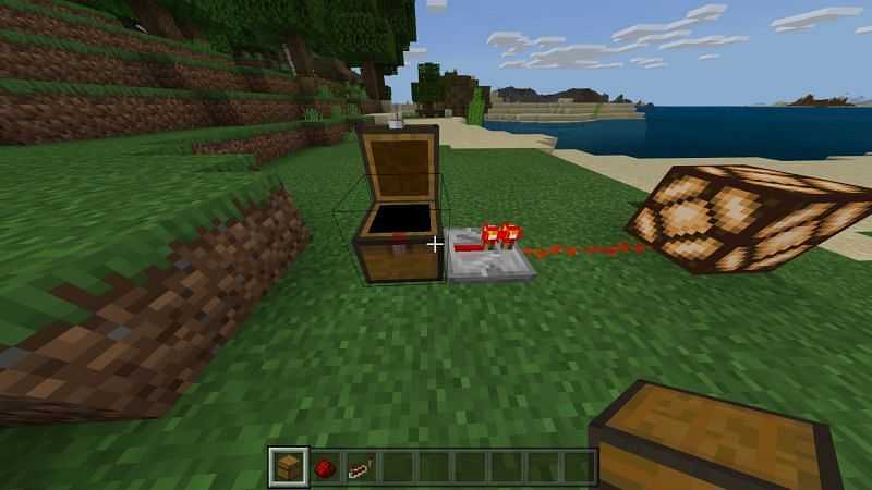 Placing the redstone repeater next to the chest to extend the pulse